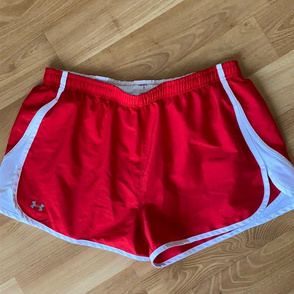 Red and white Under Armour athletic shorts
